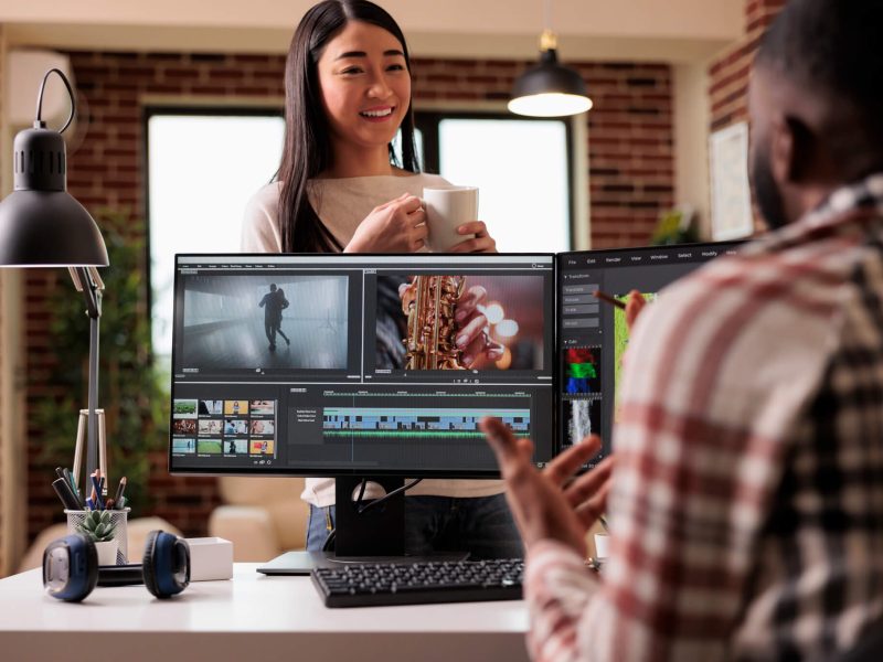 girl stand behind the computer